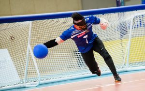 A male player taking a shot.