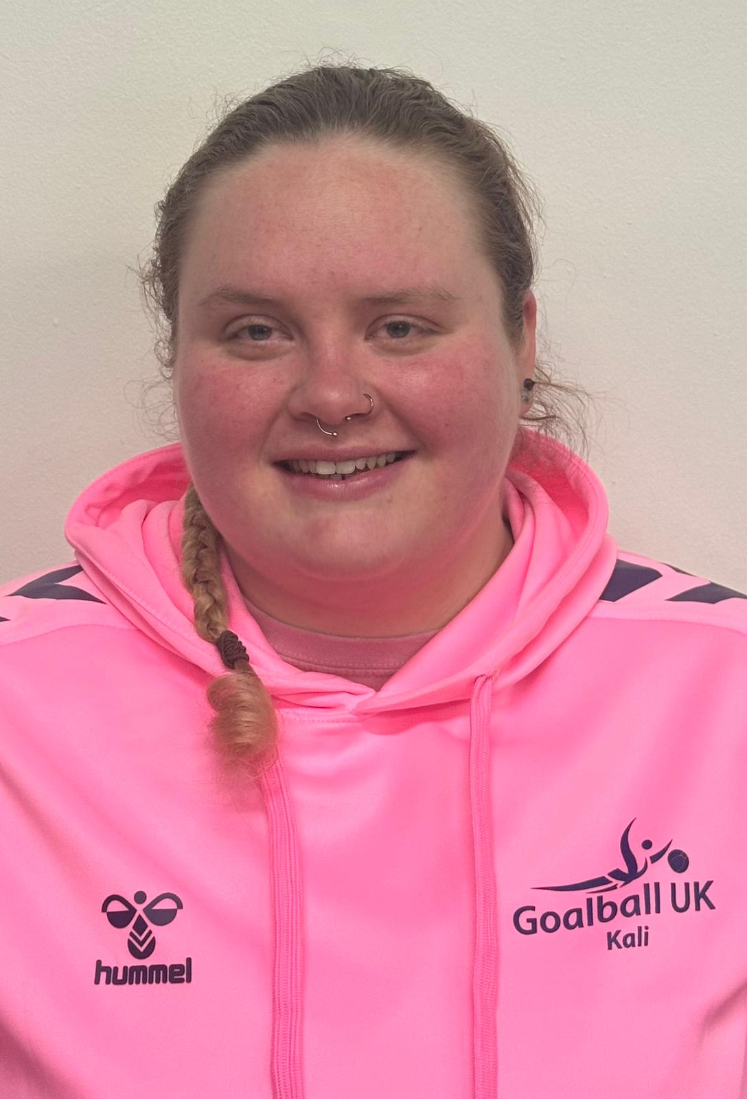 Profile photo of Youth Forum member Kali Holder in her pink Youth Forum hoodie