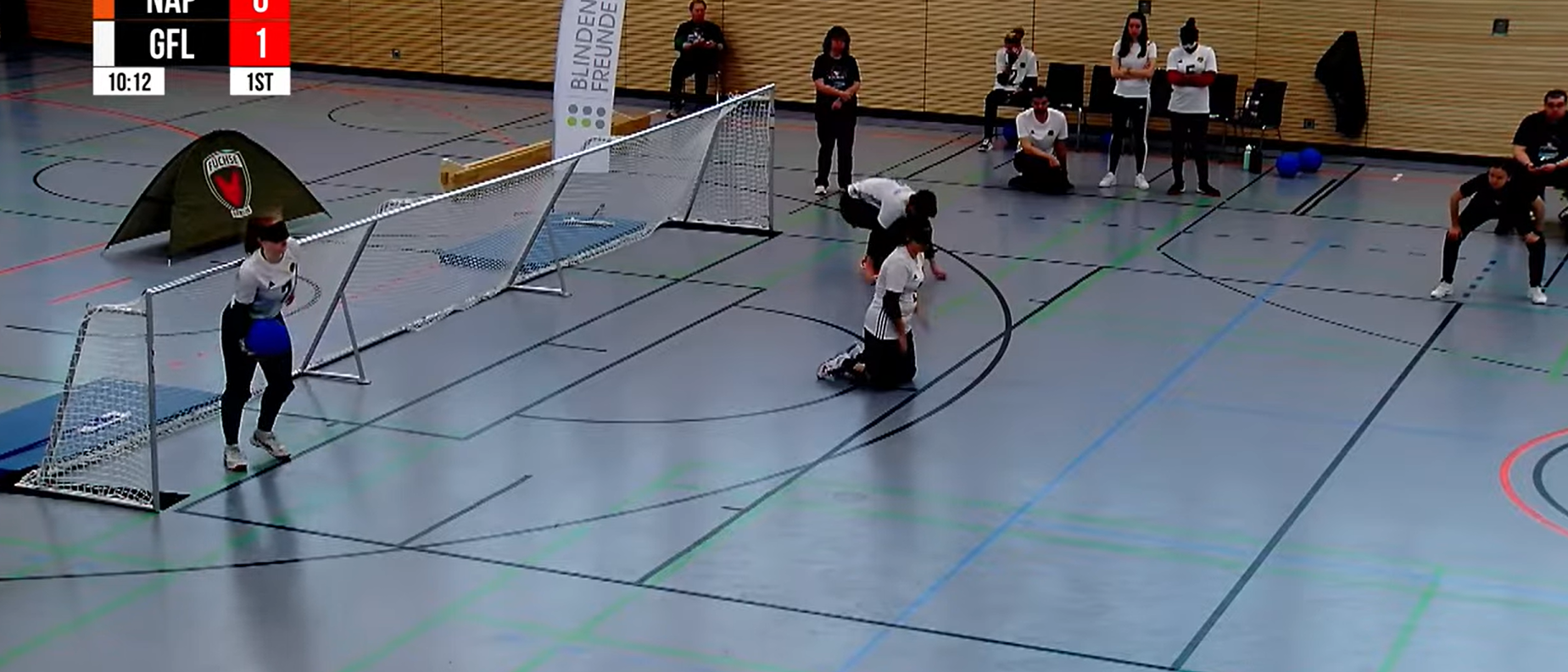 Chelsea Hudson playing for GC Golden Flash. This is a screenshot from the livestream of Chelsea running towards the high ball line to throw the ball during a game from right wing.