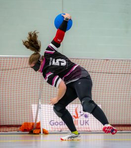 Female Player taking a shot.