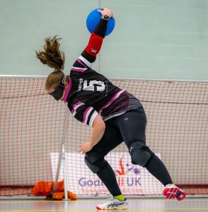 Female player taking a shot.