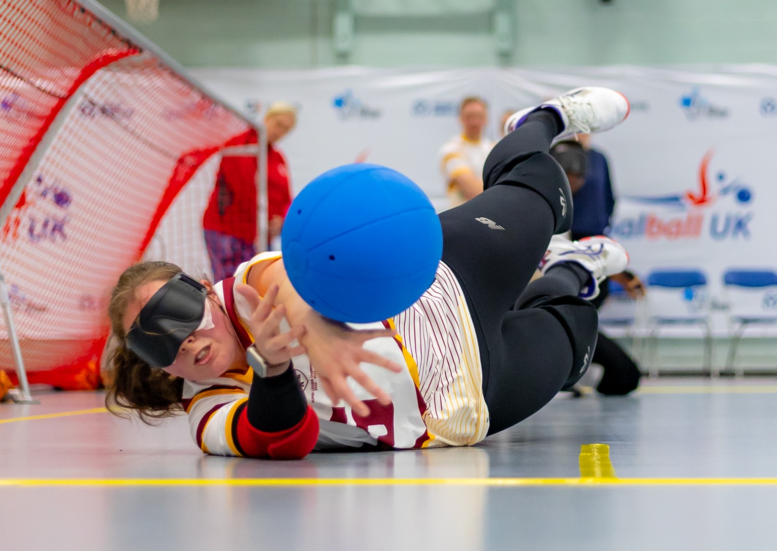 Female player saving a shot.