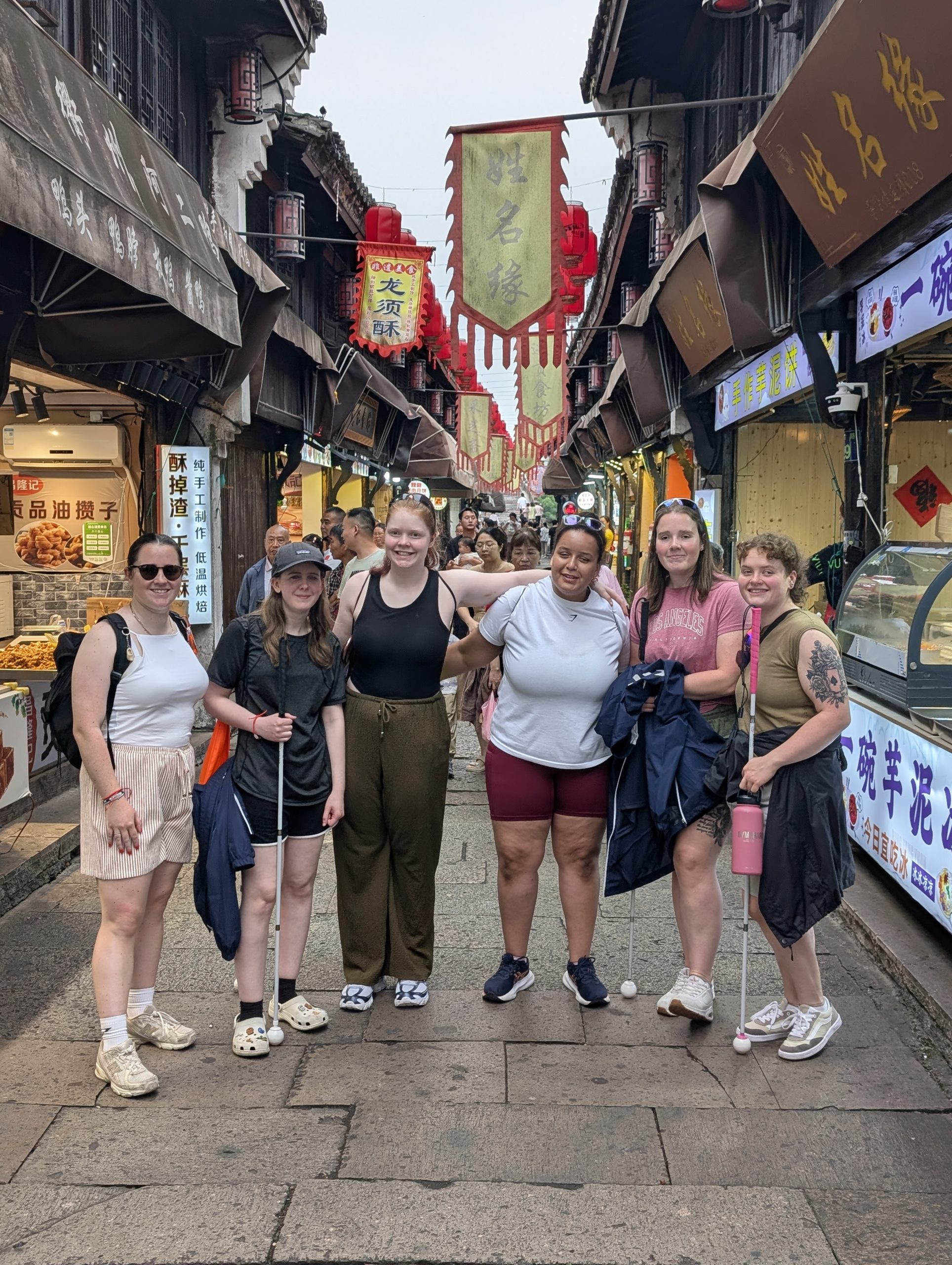 Photo of the squad in a Chinese high street as part of a sightseeing tour on a non-game day.