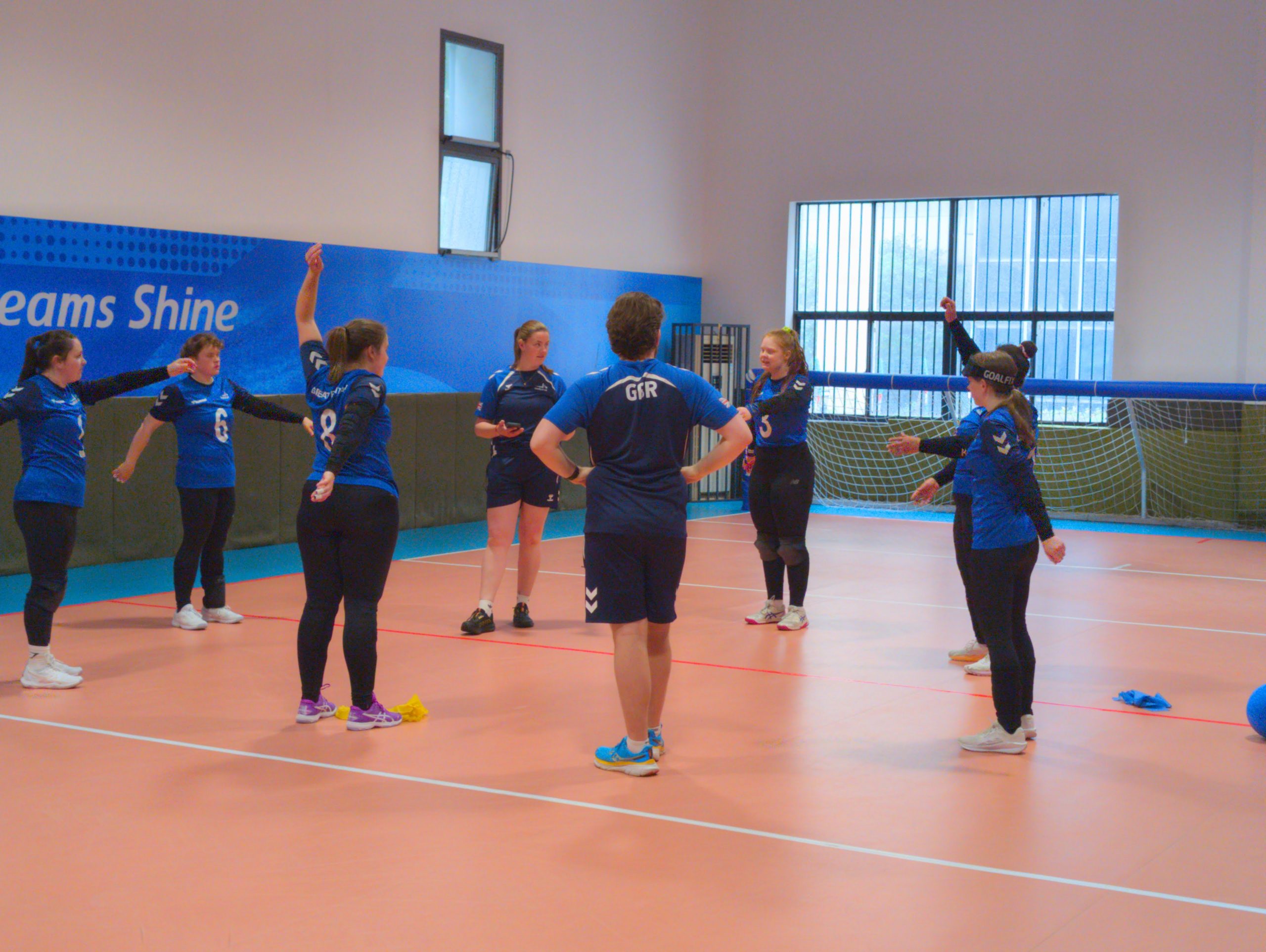 The GB Women's squad warming up on the warm up court ahead of a game at the IBSA Goalball World Championships 2026.